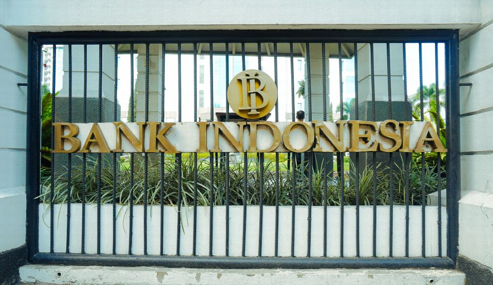 The entrance gate of Bank Indonesia in Bandung, showcasing the iconic logo and architecture. The entrance gate of Bank Indonesia in Bandung, showcasing the iconic logo and architecture.