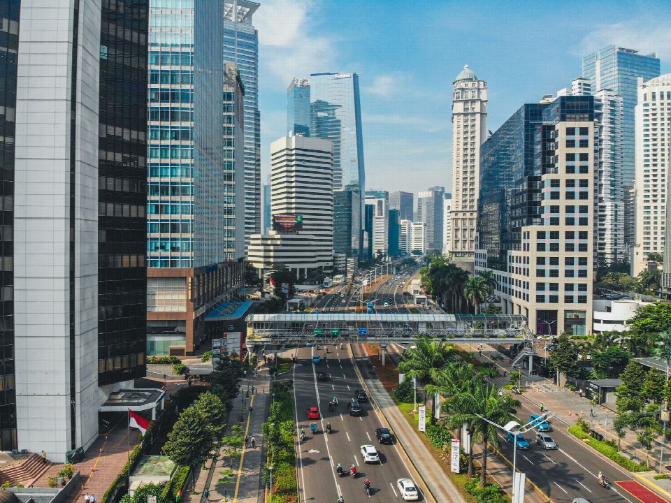 A vibrant aerial view of South Jakarta's urban skyline featuring modern skyscrapers and bustling streets. A vibrant aerial view of South Jakarta's urban skyline featuring modern skyscrapers and bustling streets.