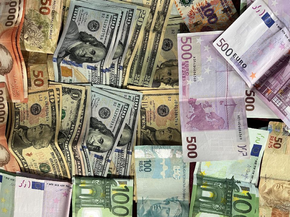 Assorted international banknotes showcasing different currencies. Ideal for finance-related themes. Assorted international banknotes showcasing different currencies. Ideal for finance-related themes.